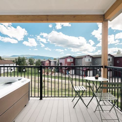 Balcony with hot tub and seating