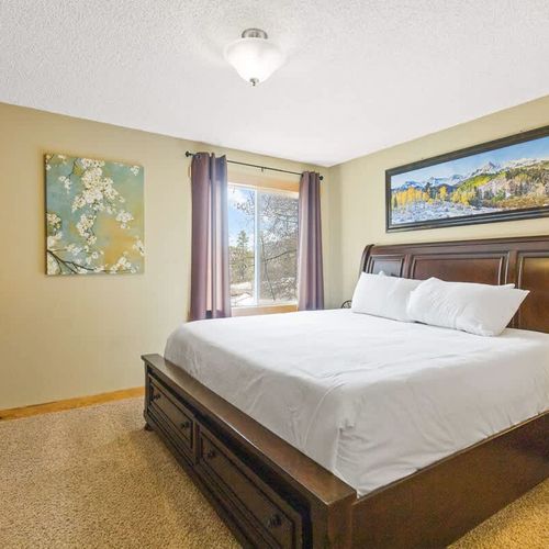 King bed in the primary bedroom