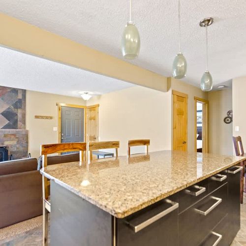 Open kitchen with wood-burning fireplace ambiance