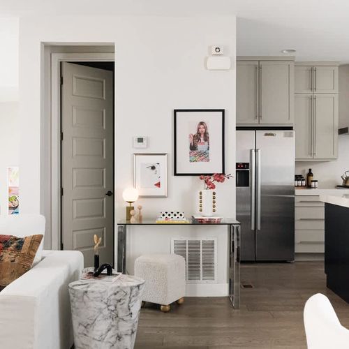 Living area, half bathroom, and kitchen