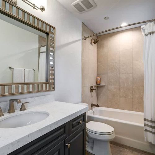 En suite bathroom to bedroom 3