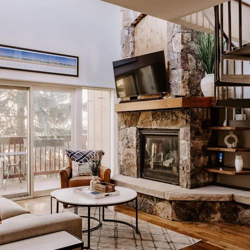 Living room with gas fireplace and Smart TV