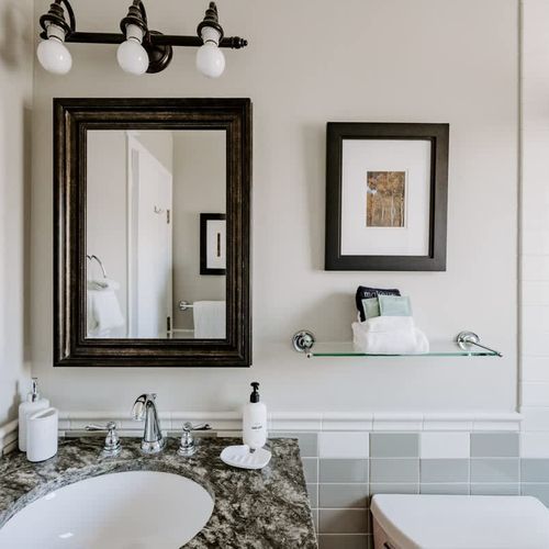 En suite bathroom to bedroom 1