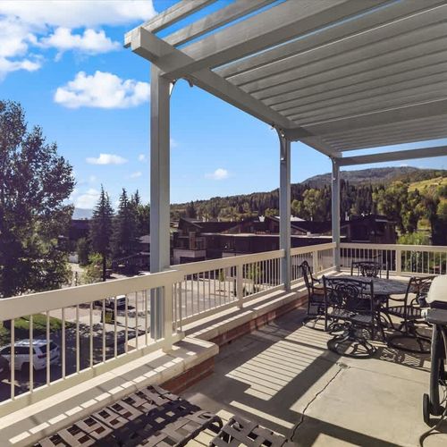 Balcony with seating and grill
