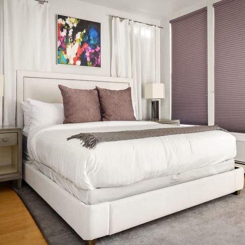 Primary bedroom with king bed + private balcony