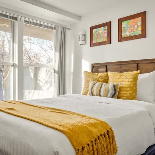 Entry level bedroom with queen bed