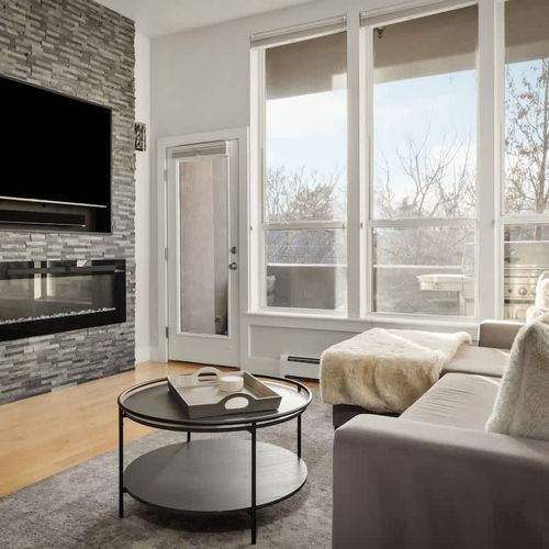 The living area has a Smart TV and balcony (fireplace is not available for guest use)