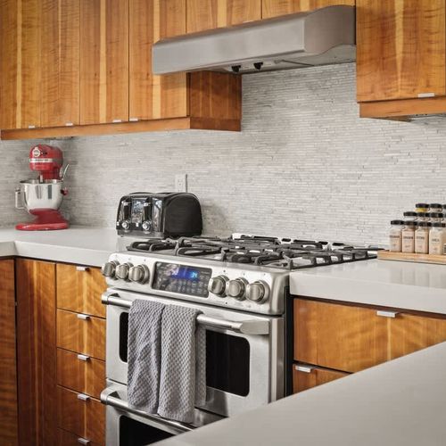 Kitchen has a gas range