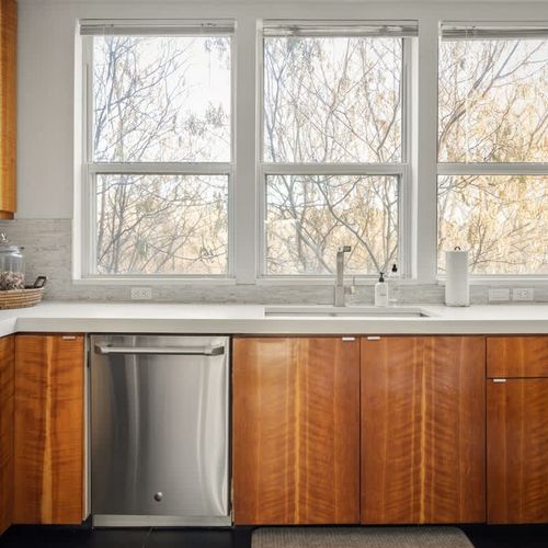 The kitchen has a lot of natural light