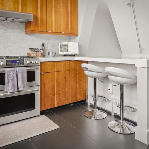 The kitchen has bar style seating