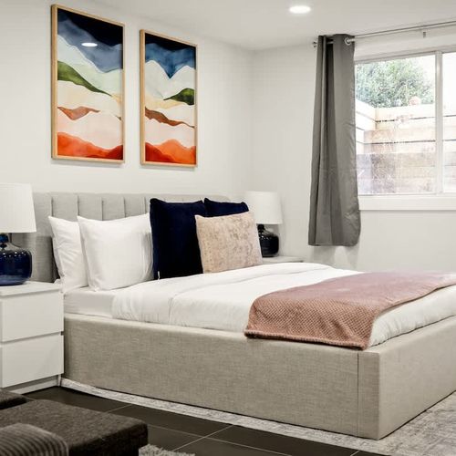 Basement bedroom with king bed