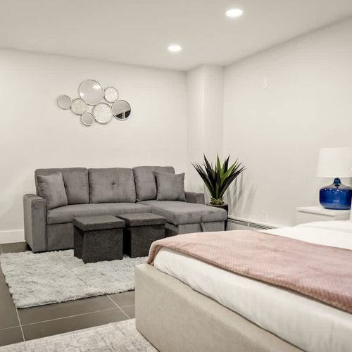 The basement bedroom also has a queen sleeper sofa