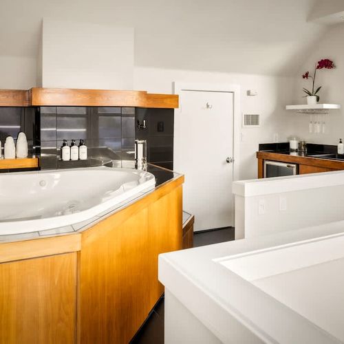 Jetted soaking tub on the top floor accessed from primary bedroom