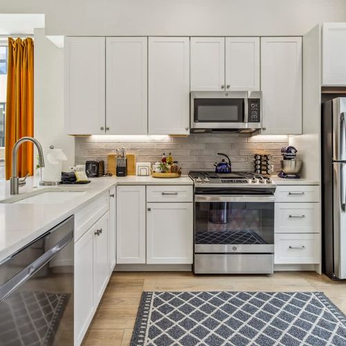 Kitchen with all stainless steel appliances