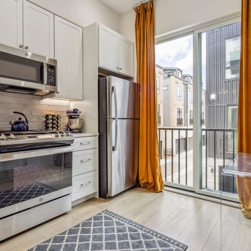 Kitchen with all stainless steel appliances