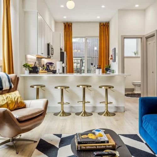 Living area seating and kitchen