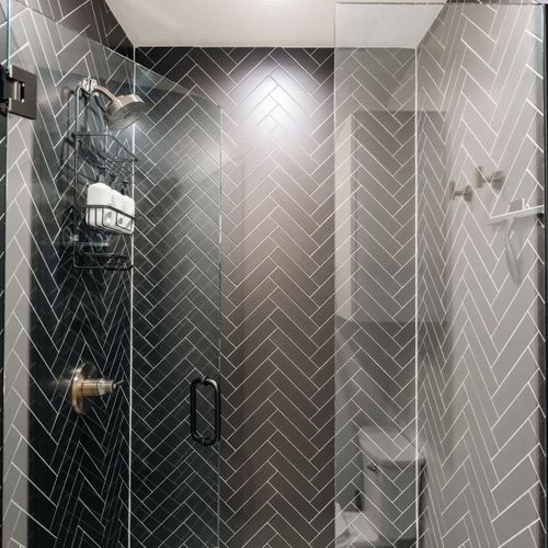 Walk-in glass shower in the primary bathroom
