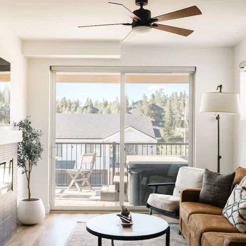 Living area with balcony exit to the hot tub