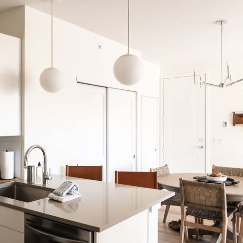 Kitchen counter seating and laundry closet