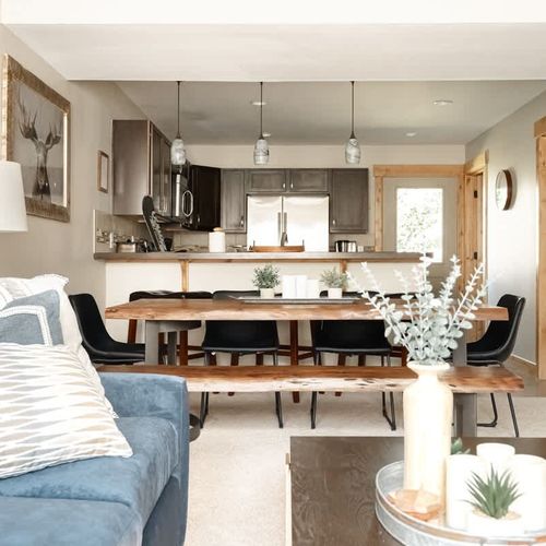 Living level with living area, dining area, and open kitchen