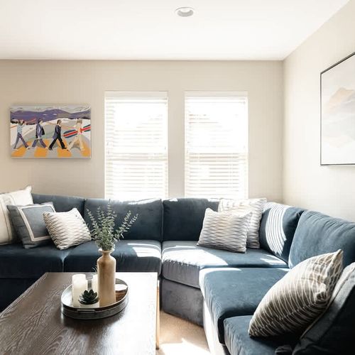 Sectional sofa with a full-size pullout sleeper sofa in the living area