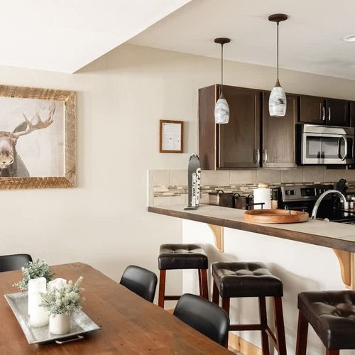 Additional seating at the bar-style kitchen counter