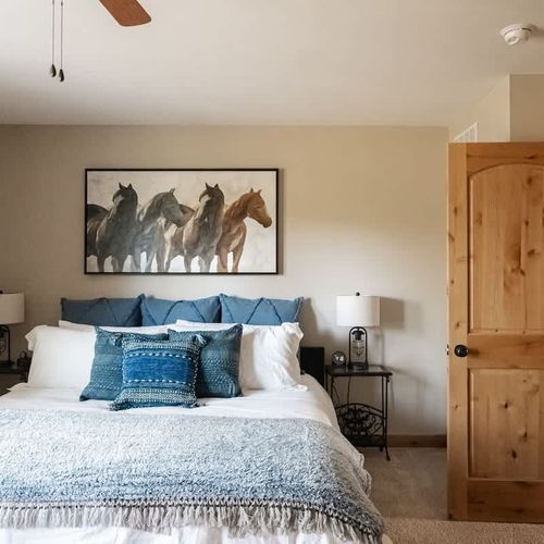 Primary bedroom with a king bed