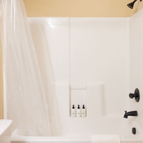 Full bathroom 3 with a tub/shower combo