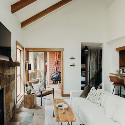 Living room opening up to the front balcony