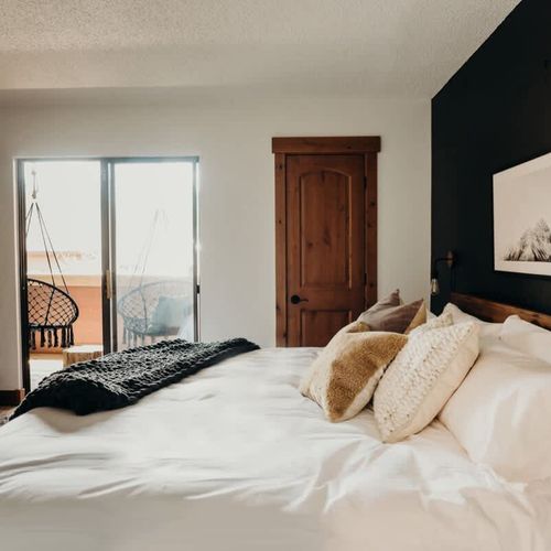Bedroom 2 opening up to the entry balcony