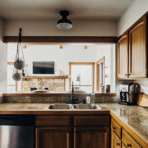 Kitchen bar opening up to the living room
