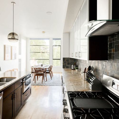 Never miss a minute of the dining experience with the open kitchen and dining areas