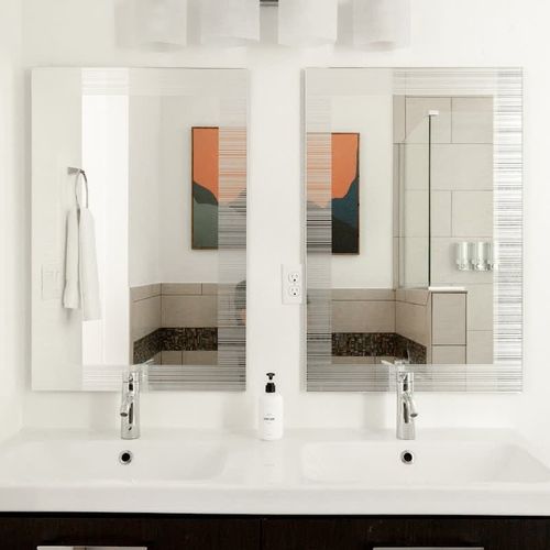 Primary ensuite bathroom with dual vanity
