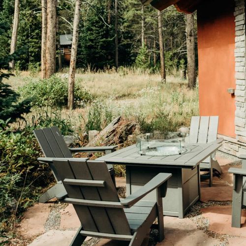Sit back and relax in an Adirondack chair on the patio