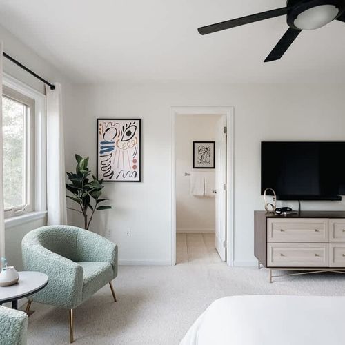 Primary king bedroom with smart TV and ensuite bathroom