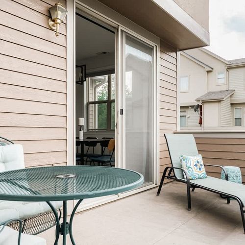Balcony on main level with table