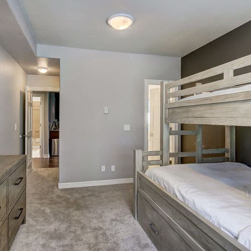 Twin over full bunkbed with twin trundle in bedroom 4