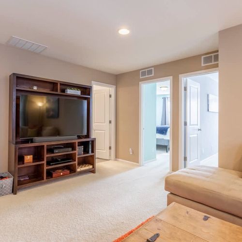 Upstairs living area with TV