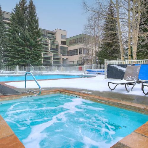 Complex outdoor heated outdoor pool and hot tub