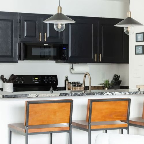 Two barstools at the kitchen counter