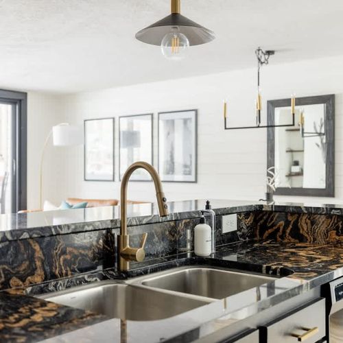 Kitchen sink looking out to living room