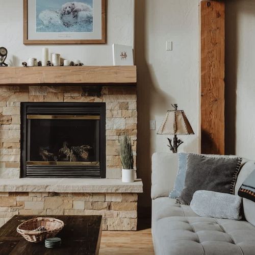 Living room has a gas fireplace