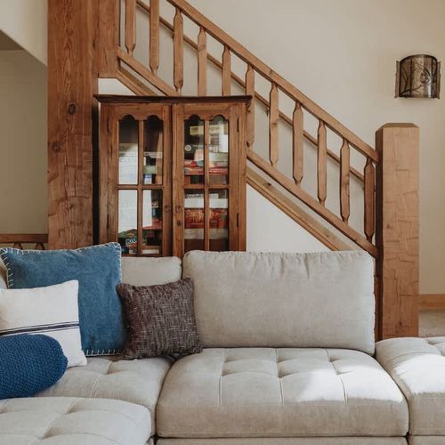 Stairs from the main living area to the second and third bedrooms