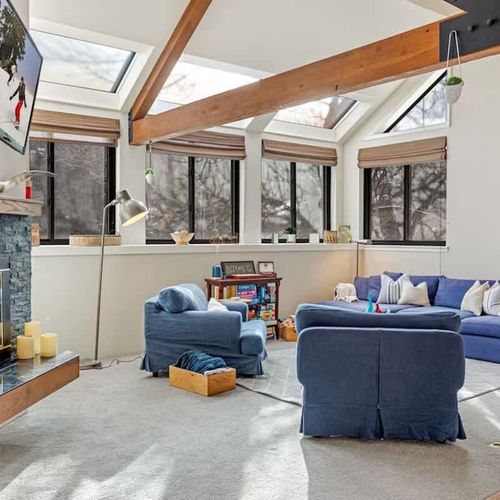 Living room with Smart TV and gas fireplace