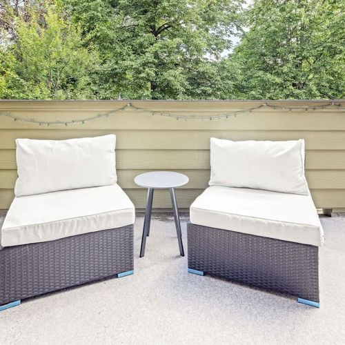 Balcony with table and two chairs