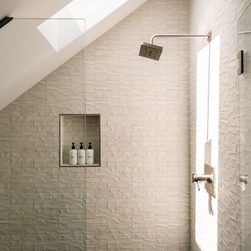 3rd floor full bathroom with skylight