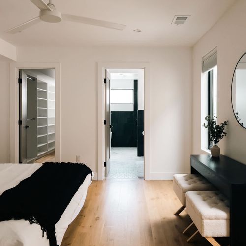 Primary bedroom with king bed and en suite bathroom