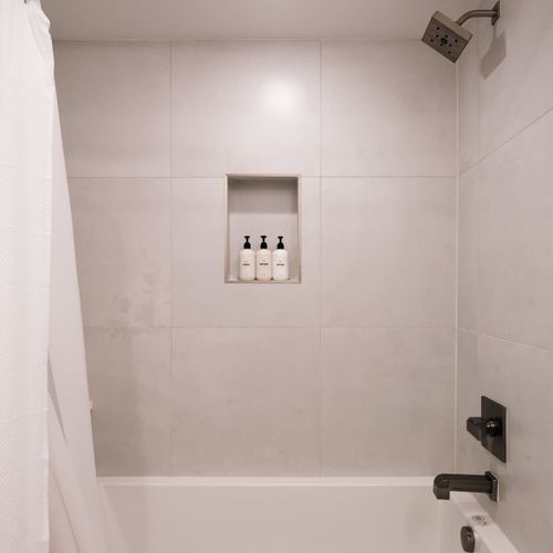 Full bathroom 4 in basement with bathtub