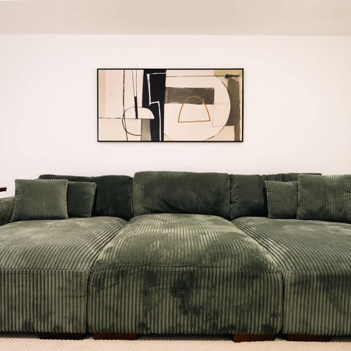 Large sofa in basement living area
