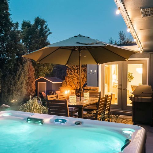 Hot tub, seating, and grill